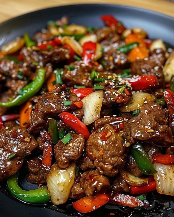 مطبخ الكنانة "ستيك اللحم بالفلفل الملون  على الطريقة الصينية (Beef Stir-fry)